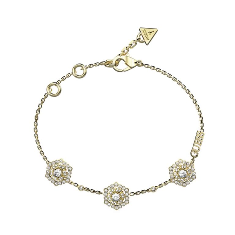 Pulseira Guess La Fleur dourada com três flores adornadas por cristais, delicada e encantadora.