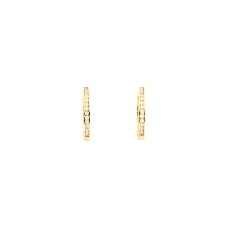 Argolas de ouro reversíveis com um lado com pedras e outro liso.