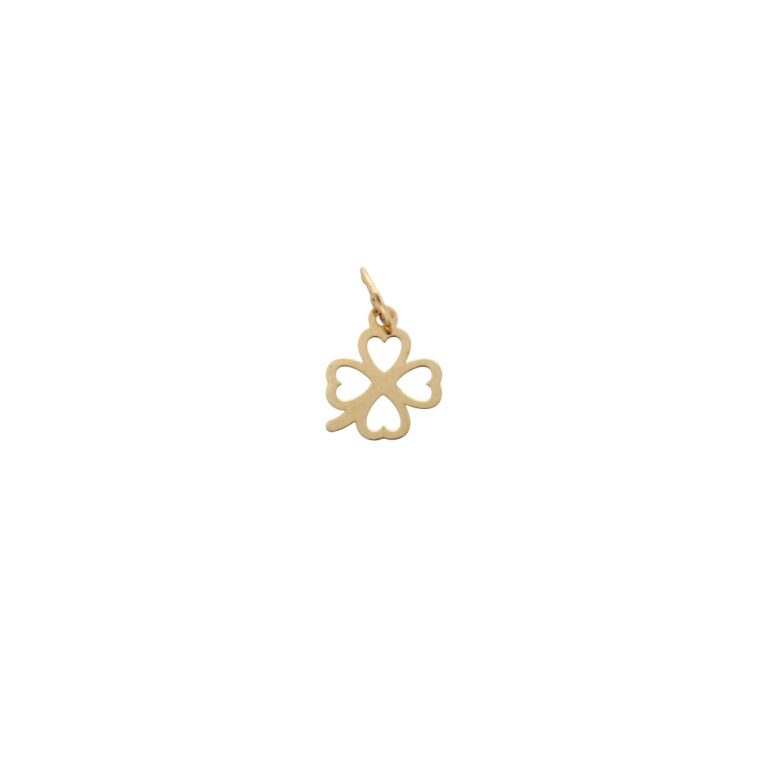 Medalha de ouro com trevo recortado, design minimalista e simbólico.